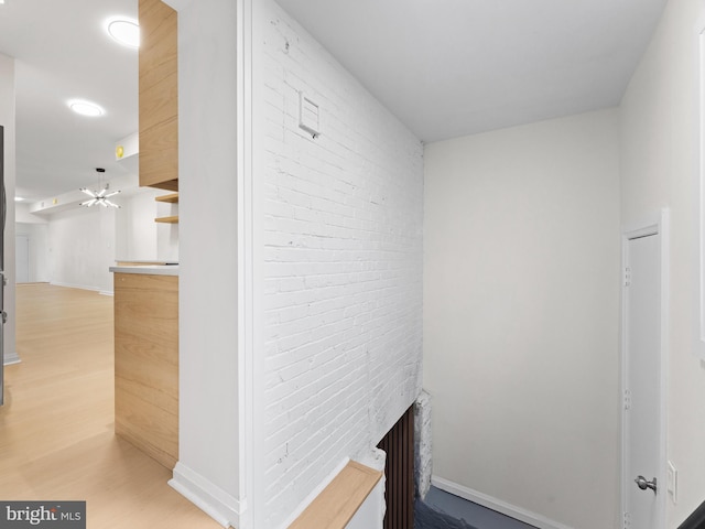 hallway with light wood-type flooring