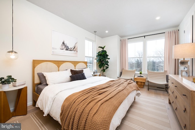 bedroom with light wood-type flooring