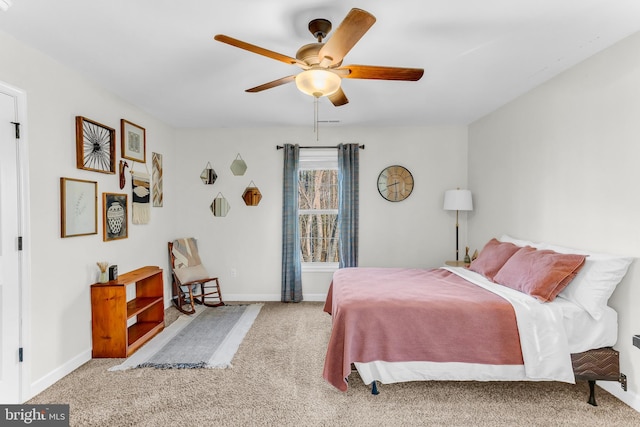 bedroom featuring light carpet and ceiling fan