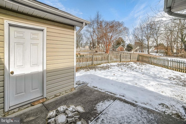 view of snow covered patio