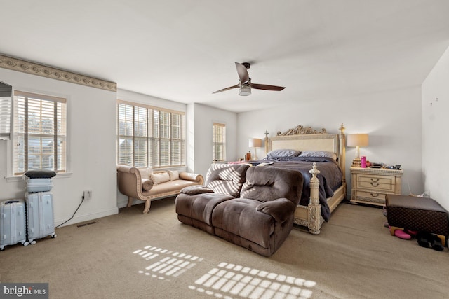 carpeted bedroom featuring ceiling fan