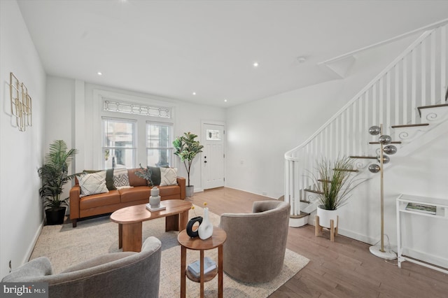 living room with hardwood / wood-style floors