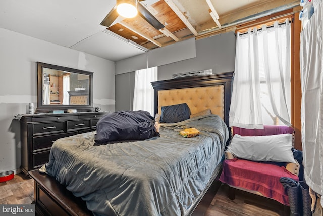 bedroom featuring ceiling fan and wood-type flooring