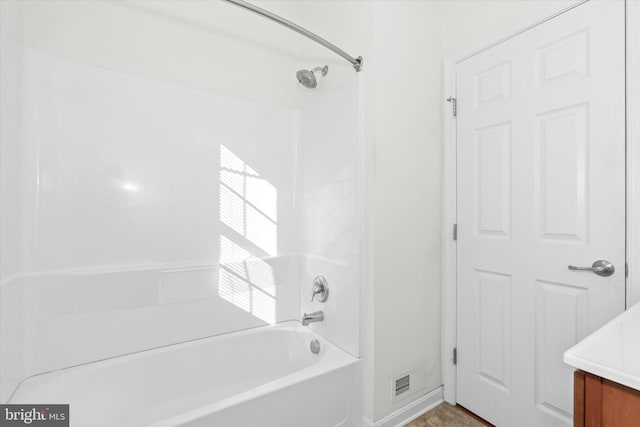 bathroom featuring shower / tub combination