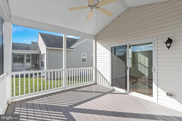 wooden deck featuring ceiling fan