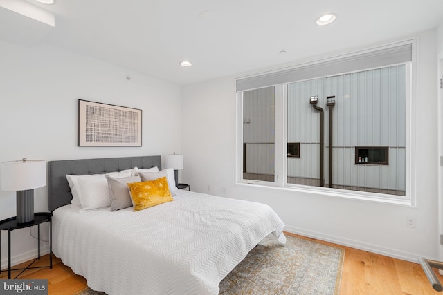 bedroom featuring hardwood / wood-style floors