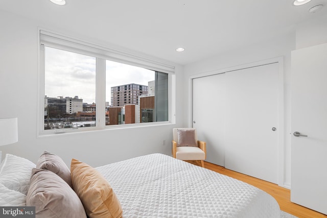 bedroom with light wood-type flooring