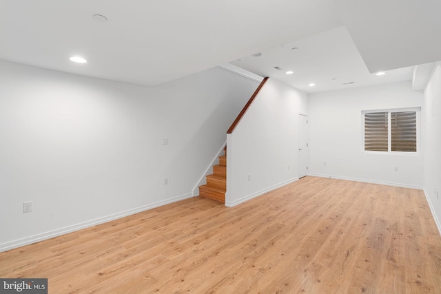 unfurnished living room with light wood-type flooring