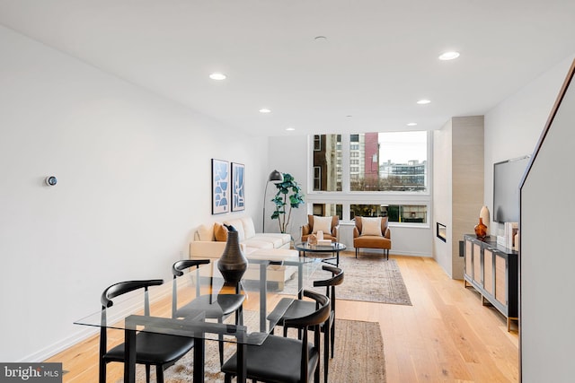 dining room with light hardwood / wood-style flooring