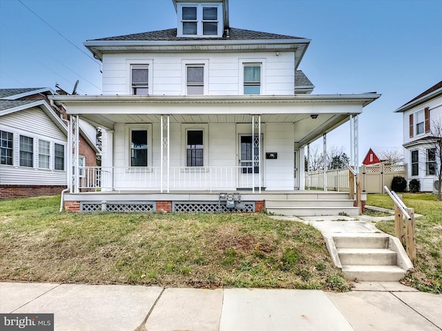 view of front facade featuring a front yard