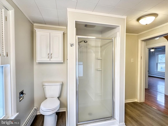 bathroom featuring hardwood / wood-style floors, a baseboard radiator, and walk in shower