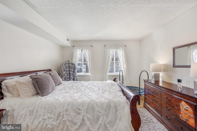 bedroom with a textured ceiling