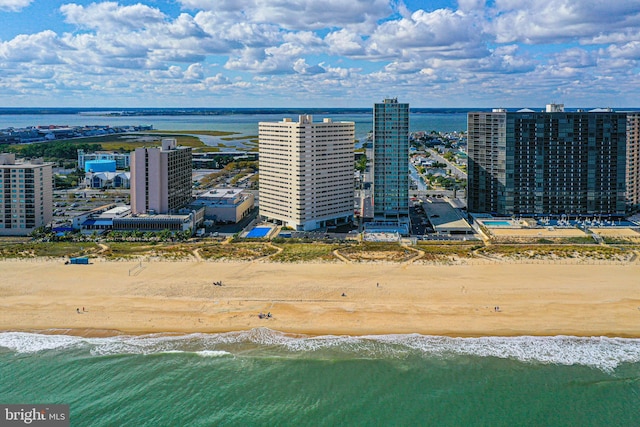 aerial view featuring a water view and a view of the beach