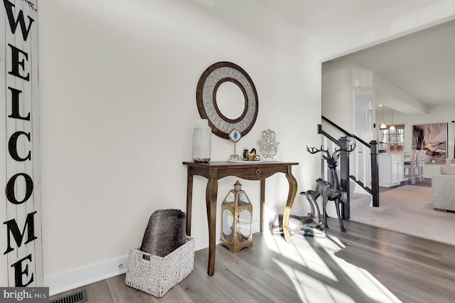 living area featuring hardwood / wood-style floors