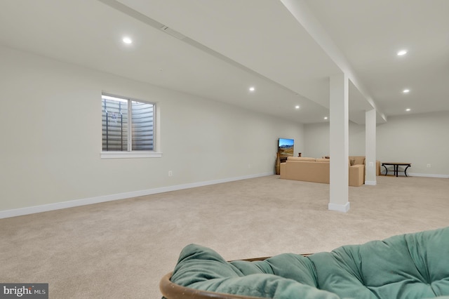 basement with light colored carpet