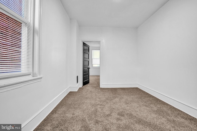 spare room with carpet flooring