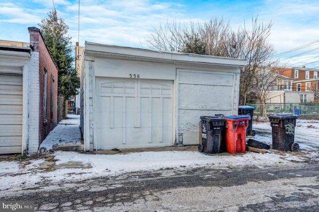 view of snow covered garage