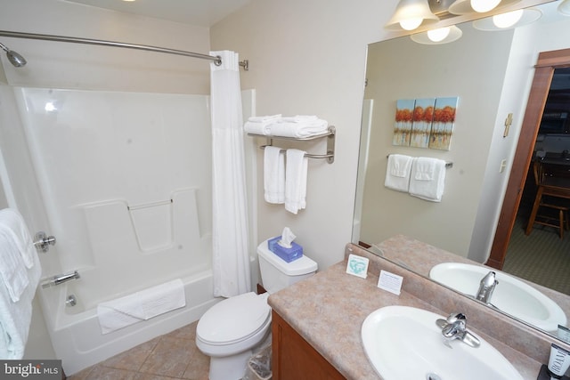 full bathroom featuring tile patterned flooring, vanity, toilet, and shower / tub combo with curtain