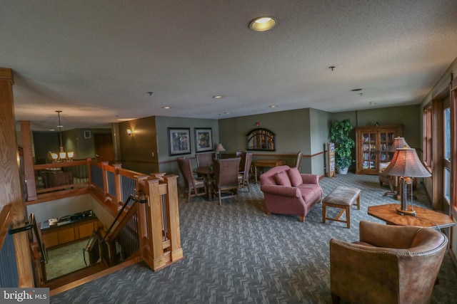 living room featuring a textured ceiling