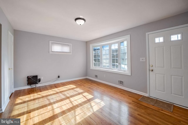 foyer with light hardwood / wood-style floors