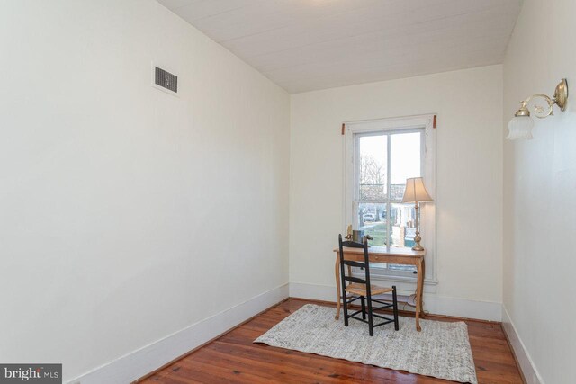 office area with hardwood / wood-style floors