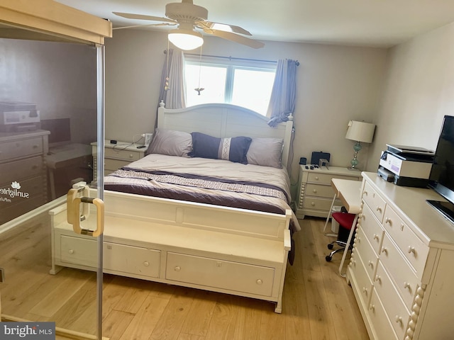 bedroom featuring ceiling fan and light hardwood / wood-style flooring