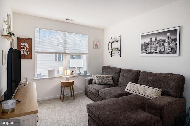 living room with light colored carpet