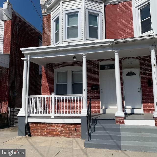 multi unit property featuring covered porch