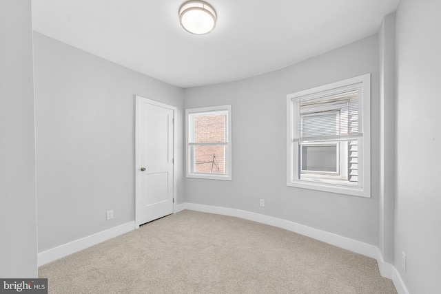 view of carpeted spare room