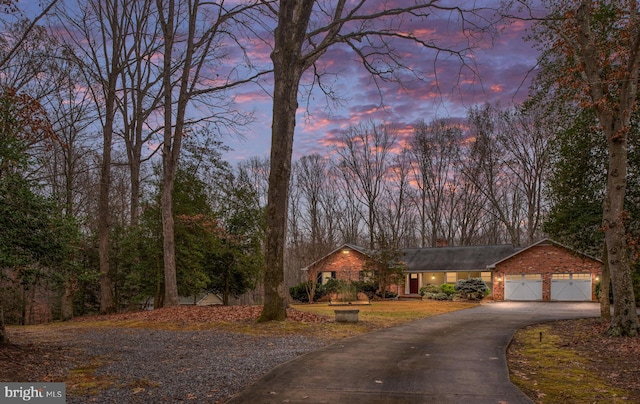 view of front of property with a garage