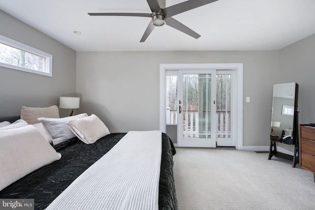 carpeted bedroom with access to outside and ceiling fan