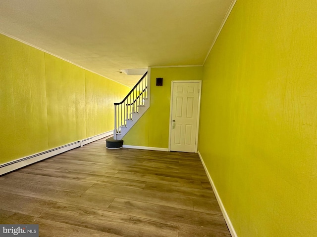 interior space featuring crown molding and wood-type flooring