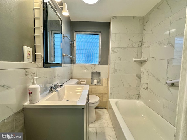 bathroom featuring toilet, decorative backsplash, vanity, and tile walls