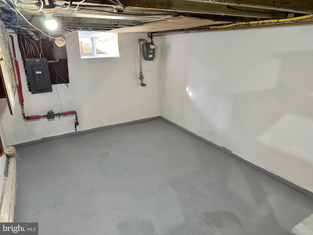 basement featuring electric panel