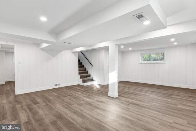 basement featuring hardwood / wood-style flooring