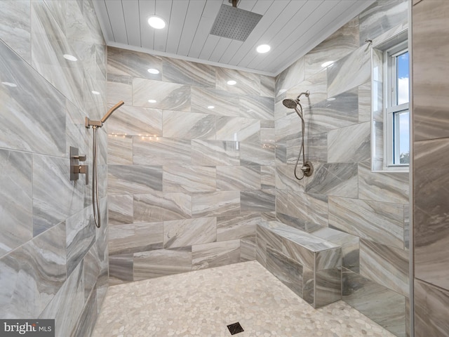 bathroom featuring tiled shower