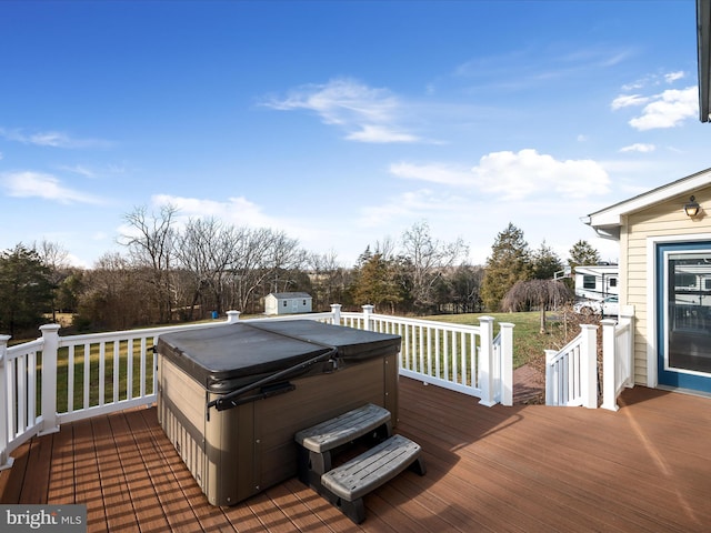 deck featuring a hot tub