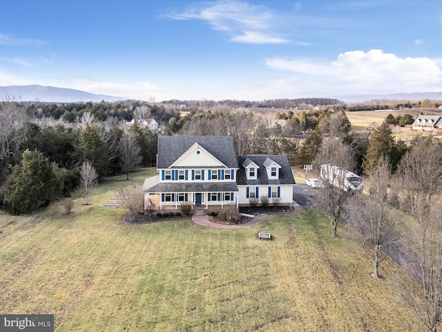 drone / aerial view featuring a mountain view