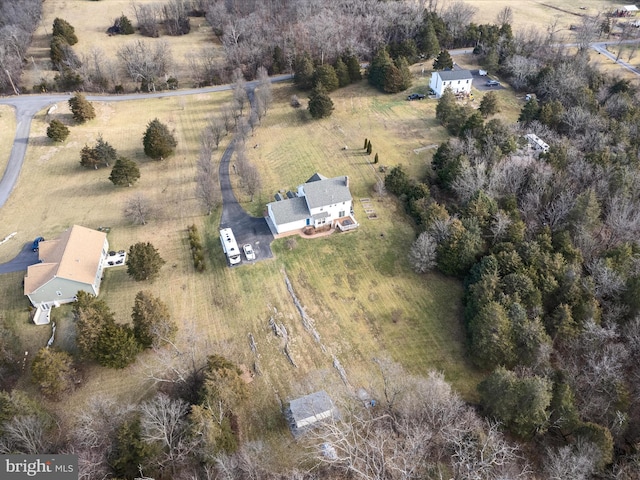 birds eye view of property featuring a rural view