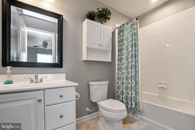 full bathroom featuring ceiling fan, shower / tub combo with curtain, vanity, and toilet