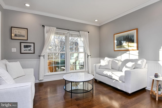 living room with dark hardwood / wood-style floors and ornamental molding