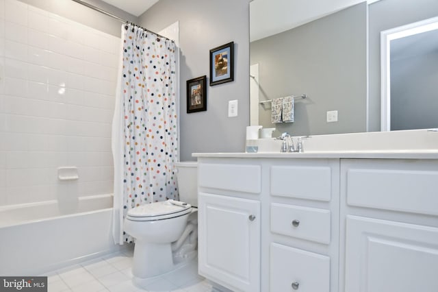 full bathroom featuring tile patterned flooring, vanity, toilet, and shower / tub combo