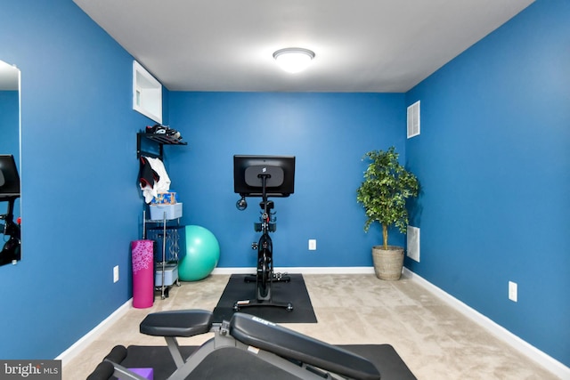 workout area with carpet flooring