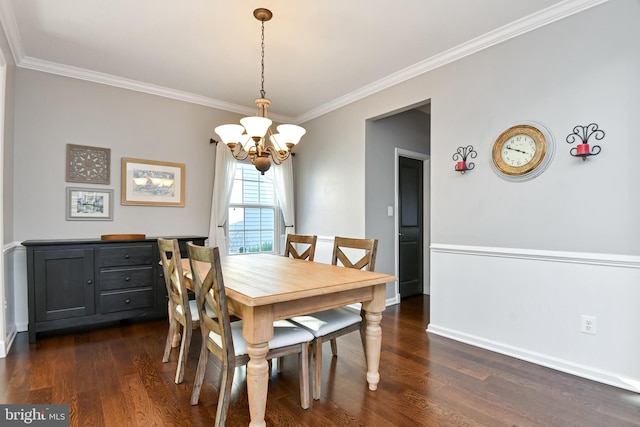 dining area featuring a chandelier, crown molding, and dark wood-type flooring