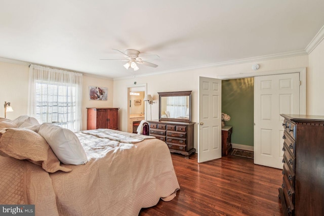 bedroom featuring ceiling fan, dark hardwood / wood-style flooring, and crown molding