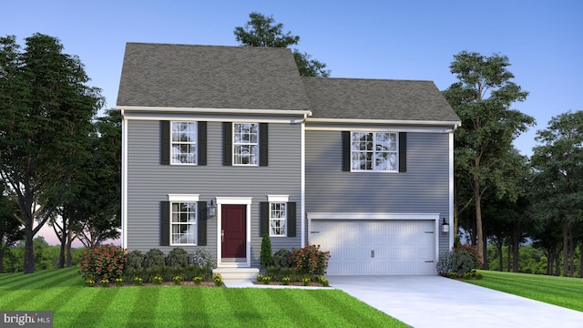 view of front of property with a garage and a yard