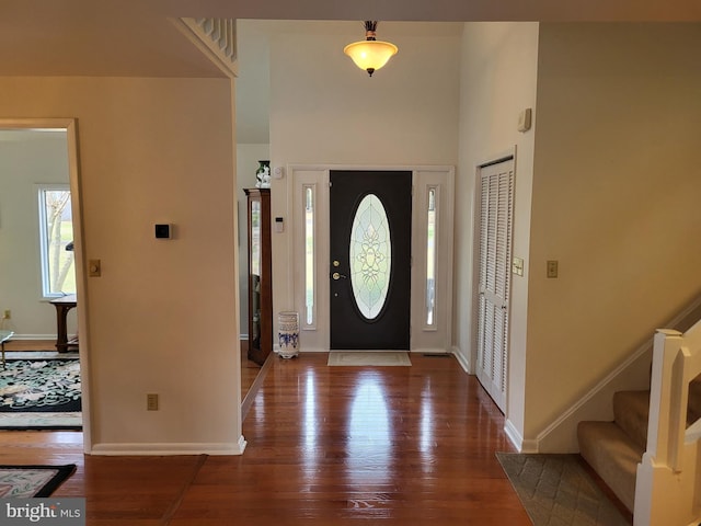 foyer entrance featuring hardwood / wood-style flooring