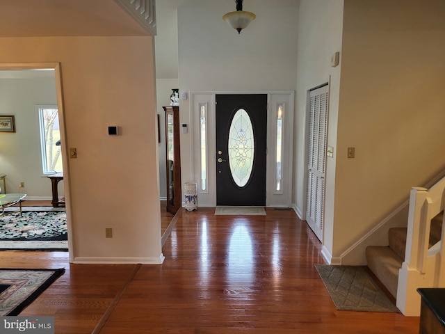 entrance foyer featuring hardwood / wood-style floors