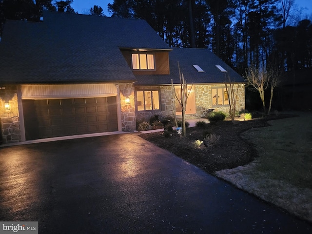 view of front of property with a garage