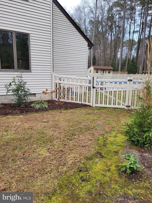 view of home's exterior featuring a lawn